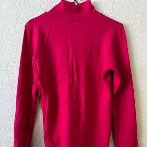 It is a pink long-sleeved T-shirt with a soft touch with a long neck.